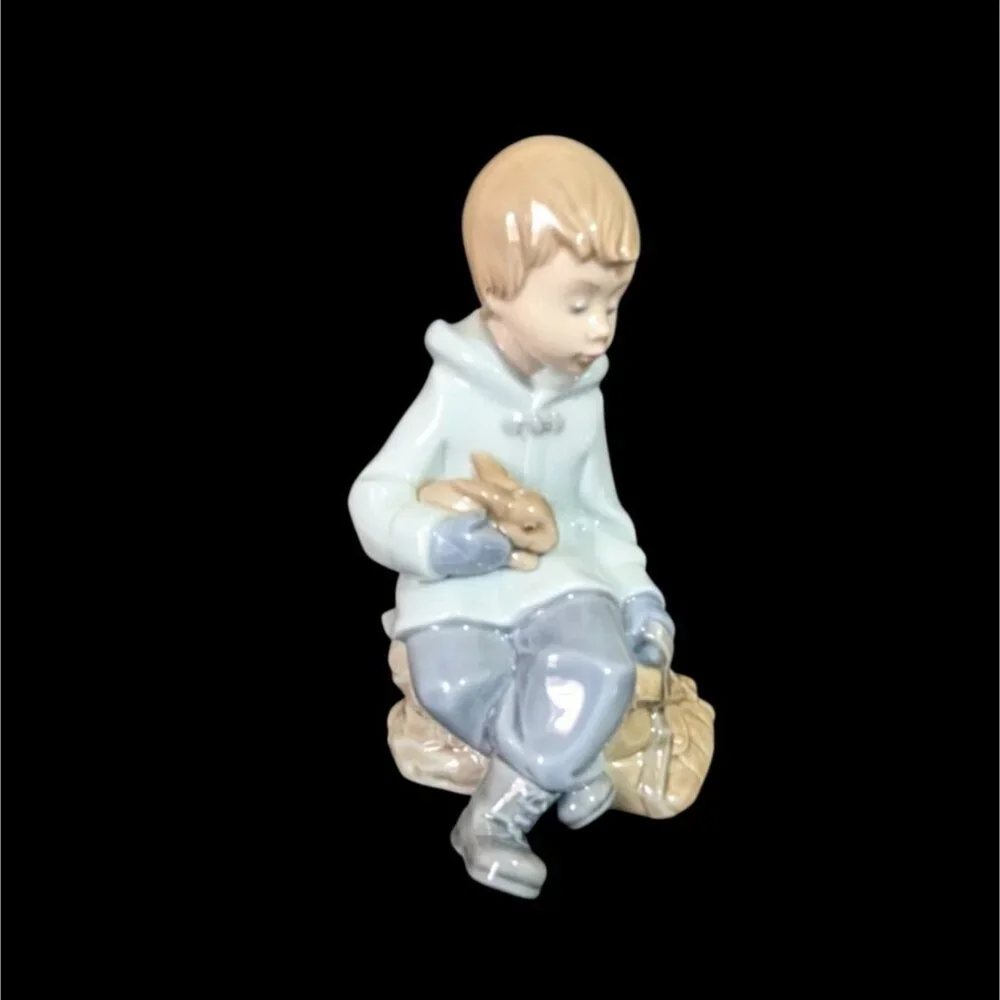NAO by Lladro 1987 Figurine Boy Sitting on Bag Holding Bunny Rabbit‎ Vintage